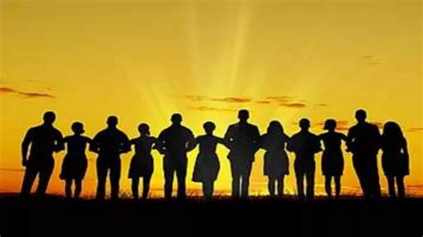 Missionaries and Members Linking Arms in Ministering.